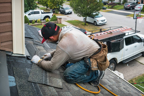 Professional Emergency Roof Repair technician working in Alpine, NJ